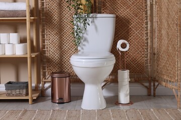 Ceramic toilet bowl, folding screen and necessities in restroom