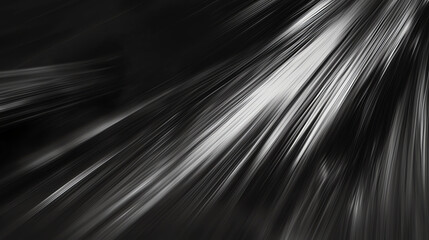 Motion blur effect creating dynamic white streaks on a dark background, conveying speed and energy in an abstract manner