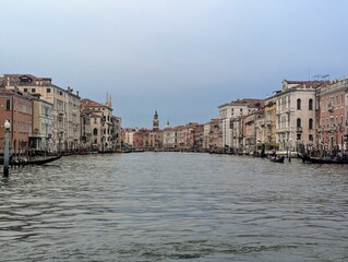 Venice Grand Canal with Historic Buildings and Gondolas on a Cloudy Day