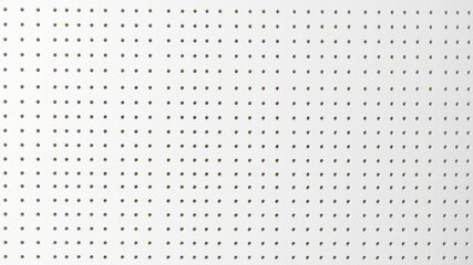 Seamless white peg board texture with evenly spaced holes and uniform design, backdrop, stock photo