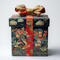luxurious gift box wrapped in ornate floral paper with red ribbon and bow, exuding elegance and sophistication. Perfect for special occasions and celebrations