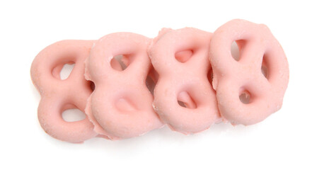 Colorful chocolate covered pretzels on white background