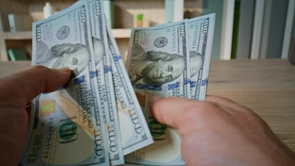 Investor hands calculating dollar bills at business deal closeup. Unknown man