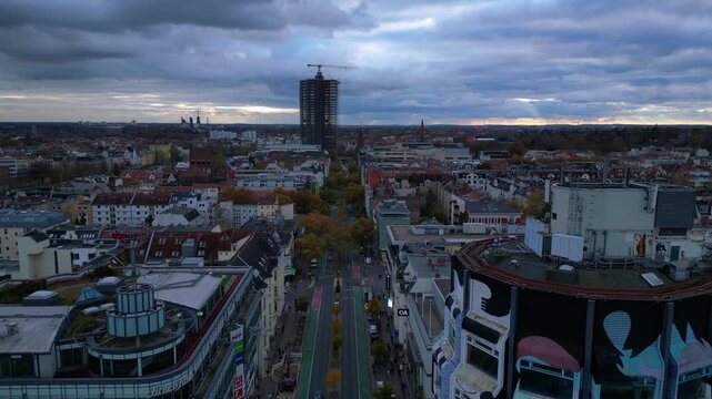 Berlin cloudy skyline over Shopping Street. Dramatic aerial view flight drone
