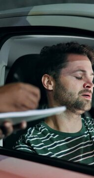 Man, car and license with police as security for drunk driving, speeding and investigation. Male person, crime and traffic officer on highway for mistake, dui and writing ticket for driver at night
