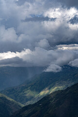 rain clouds in dark tones in the Andean mountain range of Colombia, a dramatic landscape scene 