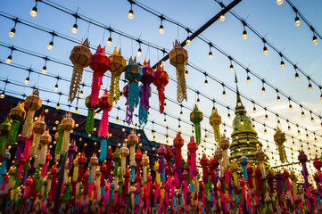 Fototapeta premium Light and Color in colorful​ Lantern​ Festival​ at Wat Phra That Hariphunchai in Lamphun, Thailand, South East Asia