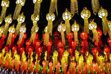 Naklejka premium Light and Color in colorful​ Lantern​ Festival​ at Wat Phra That Hariphunchai in Lamphun, Thailand, South East Asia