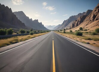 Naklejka premium Wide-angle shot of a modern paved road stretching through a valley, modern infrastructure, scenic route