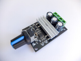 DC Motor speed controller board that regulates motor speed on a white background