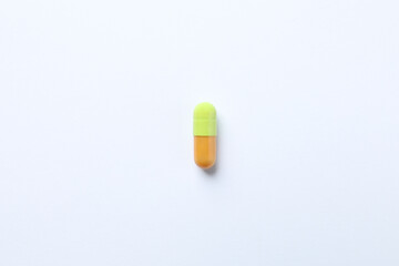 Medicine capsule on white background