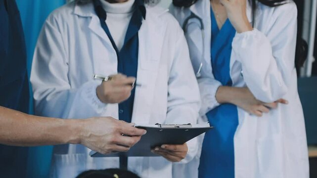 Female doctor in white coat holding hand of senior patient, giving help, comfort, psychological support, empathy at appointment. Elderly medic care, geriatric healthcare concept. Close up