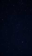 Fototapeta premium Night sky with stars sparkling on black background isolated with white highlights, png