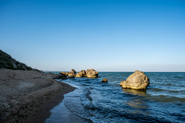 A rocky seashore on a summer day.