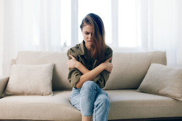 Woman in Stress, Depressed on Couch, Feeling Sad and Worried, Mental Health at Home