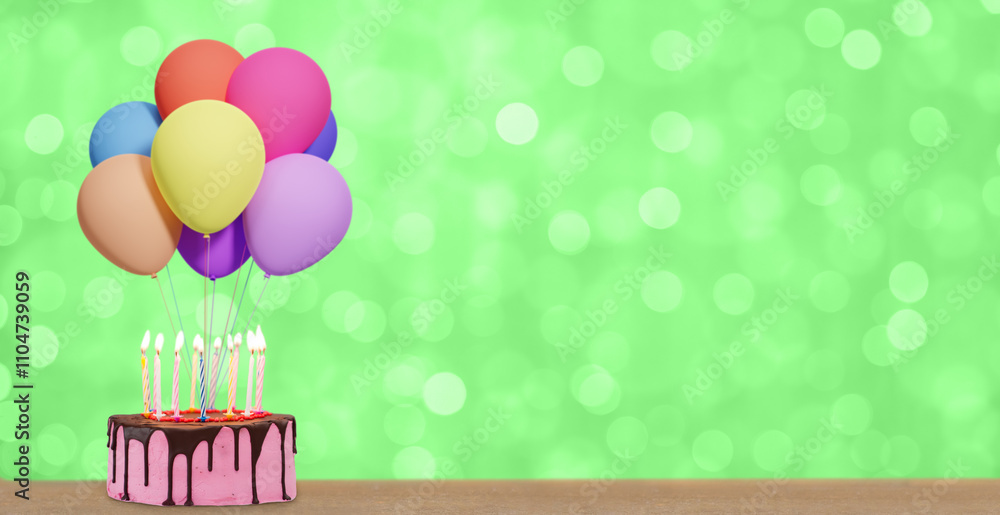 Aufkleber birthday cake with bunch of colorful balloons on blurred summer green background. empty space for te