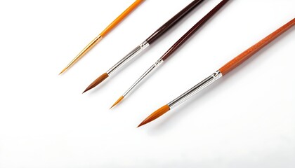 Fototapeta premium Artistic brushes meticulously depict a creative process on a white background