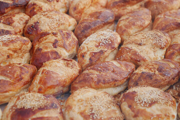 Freshly Baked Sesame Seed Pastries Are Beautifully Spread Out on Display for Customers