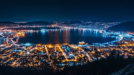 Fototapeta premium Beautiful night view of cityscape with skyscrapers. Light with reflection in the water.