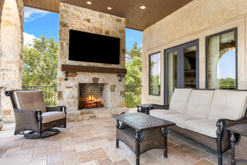 Cozy outdoor living space with fireplace and comfortable seating