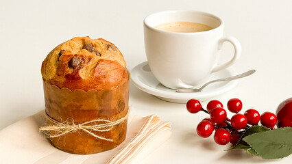 Mini Christmas panettone on the festive table with Christmas decoration.