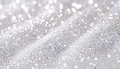 Fototapeta premium A shimmering silver and white bokeh background ideal for festive designs, holiday invitations, or elegant presentations, creating a whimsical and enchanting atmosphere.