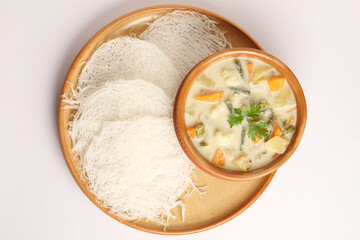 Iddiyappam and vegetable kurma made in coconut milk, A south Indian breakfast or dinner