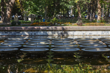 An old, non-working fountain from the USSR. Soviet urban development, city park, architecture....