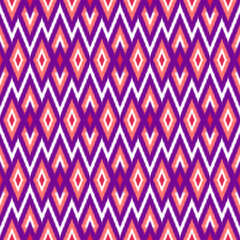 Vibrant Ikat Seamless Pattern – Purple, Red, and White Geometric Design