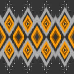 Seamless Yellow and Grey Ikat Diamond Pattern – Traditional Ethnic Geometric Design