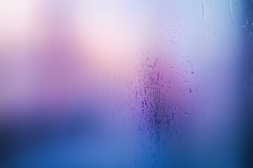 Obraz premium Close-up of a glass window surface blurred with frost or moisture on a Blue and purple gradient background. Abstract, dreamy, emotional, mood, weather, season, background.