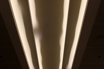 Bright lighting of buildings and structures close-up. Abstract drawings and backgrounds.