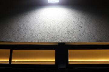 Bright lighting of buildings and structures close-up. Abstract drawings and backgrounds.