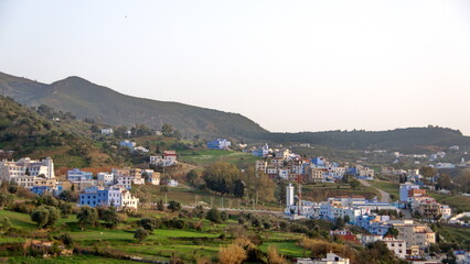 Obraz premium Houses on a hill in a suburb outside the medina in Chefchaouen, Morocco