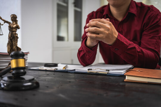 Close-up of a Thai lawyer symbolizing justice.Offering legal services online consultations.Justice emphasizes fairness,represented by Queen Justice as a universal symbol of equality  lawful guidance