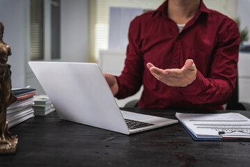 Close-up of a Thai lawyer symbolizing justice.Offering legal services online consultations.Justice emphasizes fairness,represented by Queen Justice as a universal symbol of equality  lawful guidance