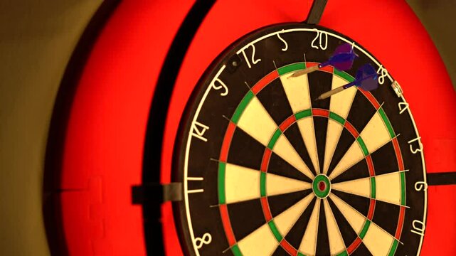 Three darts are thrown onto the dartboard. The first dart hit 20, the second hit 5 and the third hit tripple 5.
Score 40 points