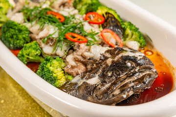 Special steamed grouper dish close-up