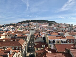 Lisbon, PORTUGAL - February 17, 2017: city skyline filled with red-roofed houses on a hill