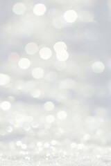Soft white bokeh background with sparkling light effects and dreamy ambiance