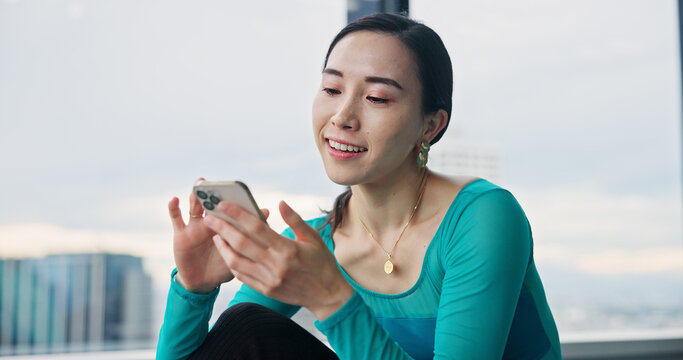 Dancer, scroll and woman with smartphone in class, browsing social media and laughing or watching video. Japanese, influencer and communication with online, audience and performer for live stream