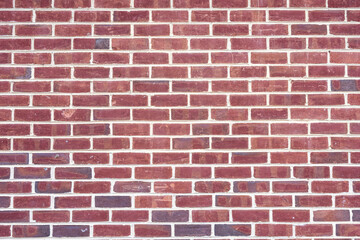 Fototapeta premium Background from a wall made of red clinker bricks