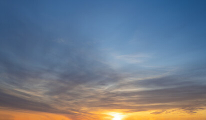 Dramatic sunset skies, cloudscape of rich color twilight sky. Sunset cloud background.