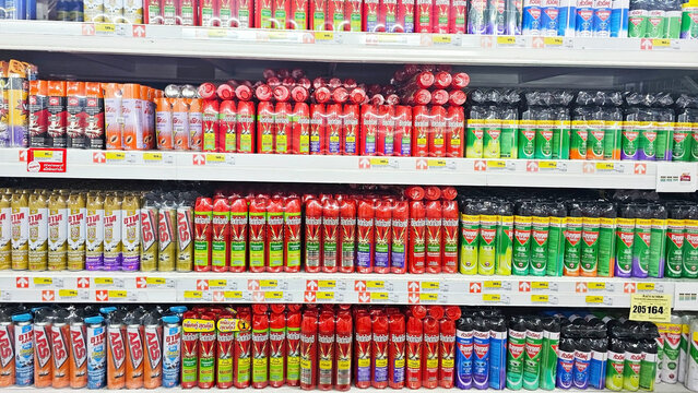 A variety of insect control options multi insect killer odorless aeresol spray. Insect repellent, Mosquito repellent spray, Fly spray, Roach trap products on shelf. Thailand, November 28, 2024