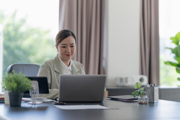 Asian female working in workplace happy and mindfulness