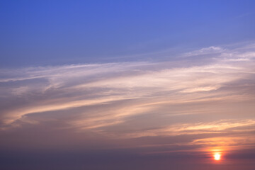 Dramatic sunset skies, cloudscape of rich color twilight sky. Sunset cloud background.