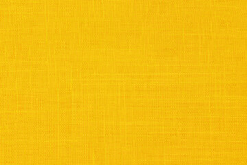 Yellow linen fabric cloth texture background, seamless pattern of natural textile.