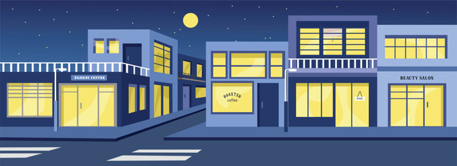 Thrift store in the night time. Shopping center. Shopping complex. Shopping plaza. Strip mall. Galleria. Market. Marketplace. Mart. Mini mall. piazza.