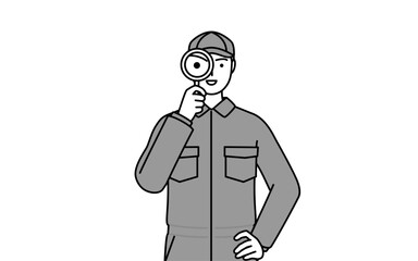 虫メガネを持って腰に手を当てるつなぎ姿の整備士