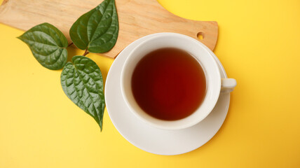 Betel leaf decoction. Betle leaf ( Daun Sirih ) boiled water has many properties such as antibacterial, anti-mutagenic, antioxidant, and anti-proliferative. top view